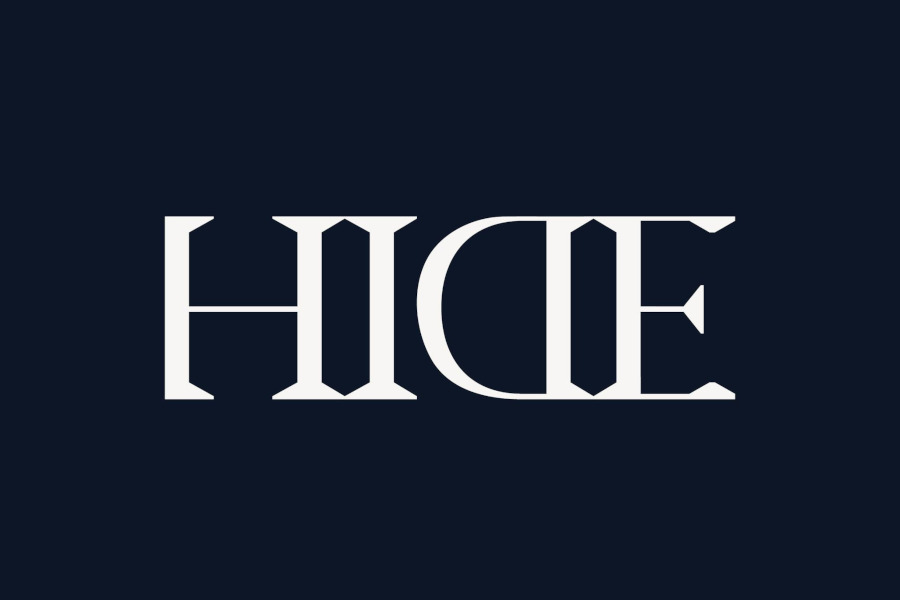Logo of HIDE nightclub in white capital letters on a dark navy blue background, using a sharp, high-contrast serif font.