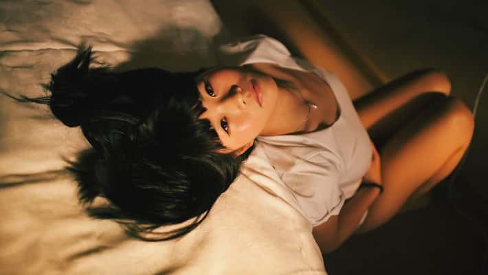 Kathoey on a bed
