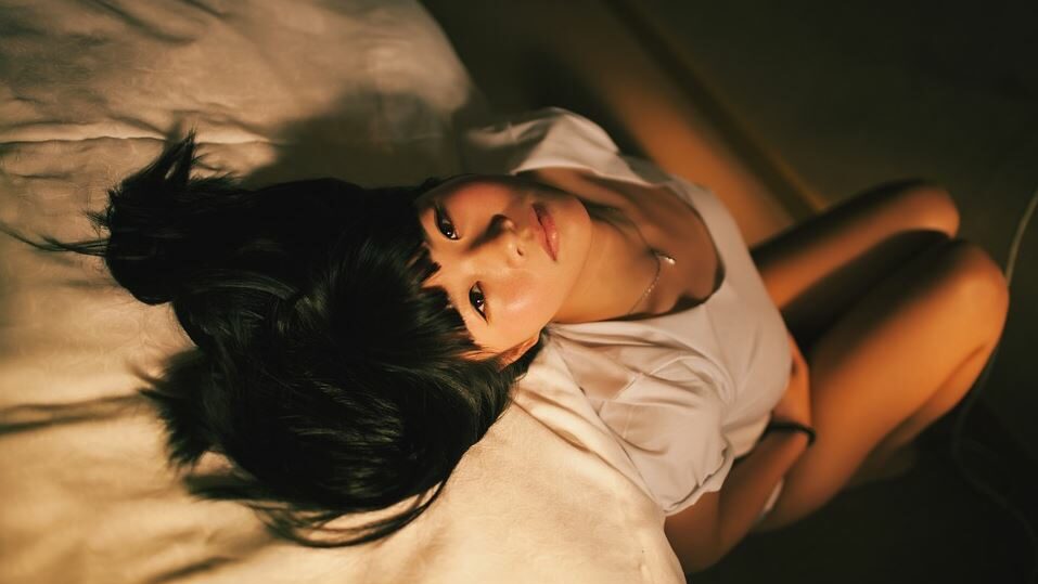 Kathoey on a bed